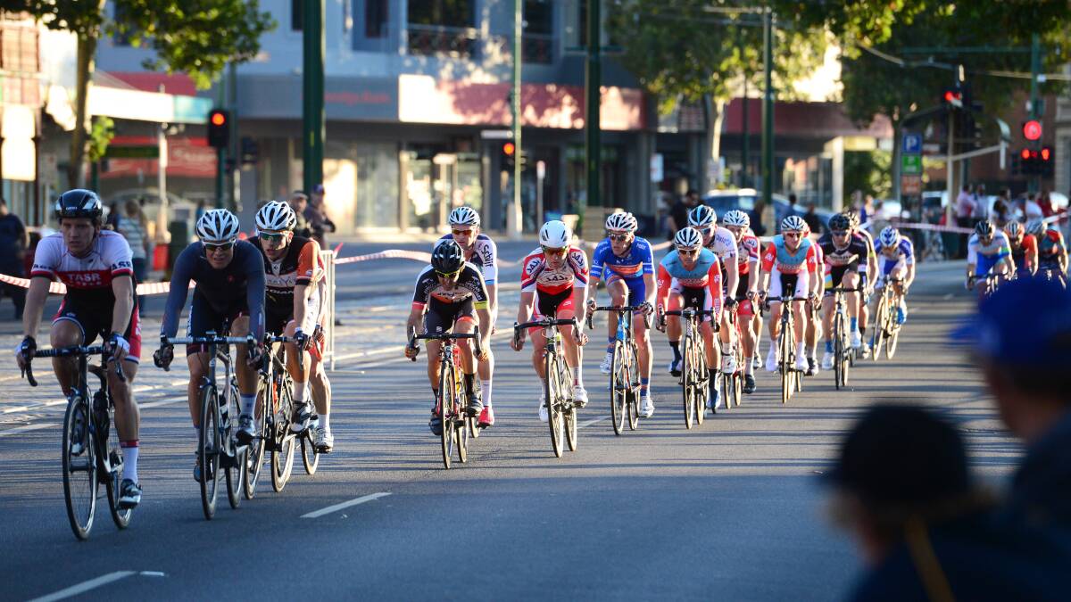 Cyclists race along Pall Mall in the Andy's Earthmovers criterium held at the Bendigo International Madison carnival. 
