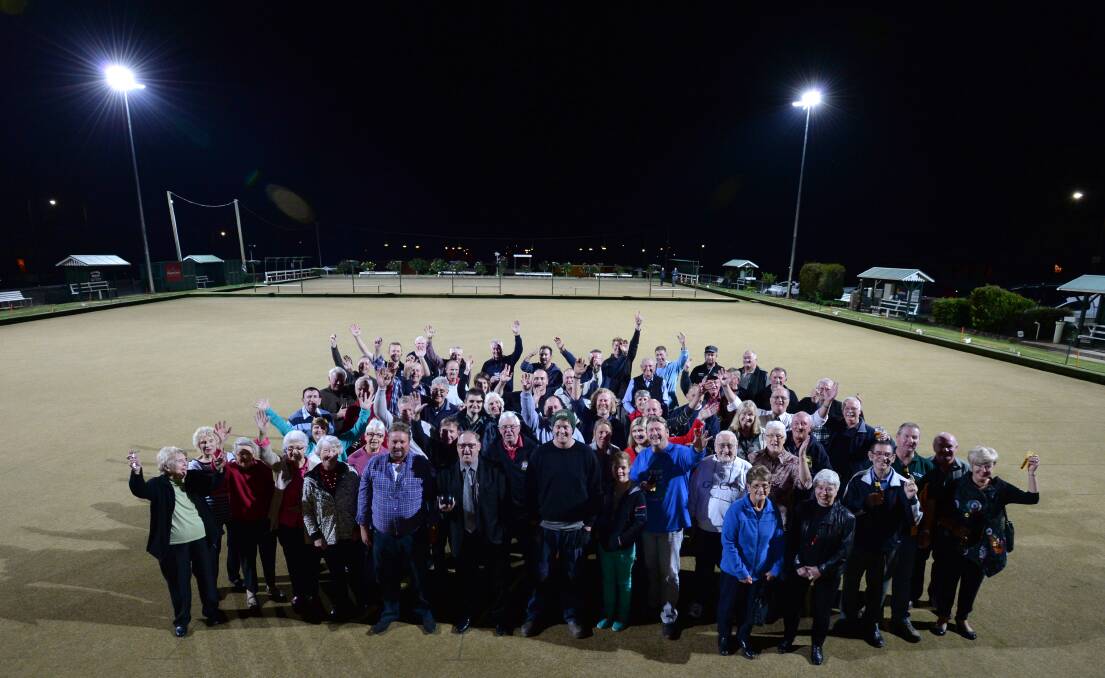 SHINE ON: South Bendigo BC members, Mayor Barry Lyons and represenatives from DeAraugo and Lea Electrical on the greens. Picture: JIM ALDERSEY