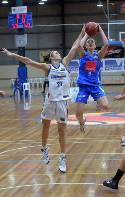 LEAP: Maddie Garrick aims for the basket in Bendigo Spirit's victory against Adelaide Lightning in the WBNL Spring Shield. Picture: BRENDAN McCARTHY