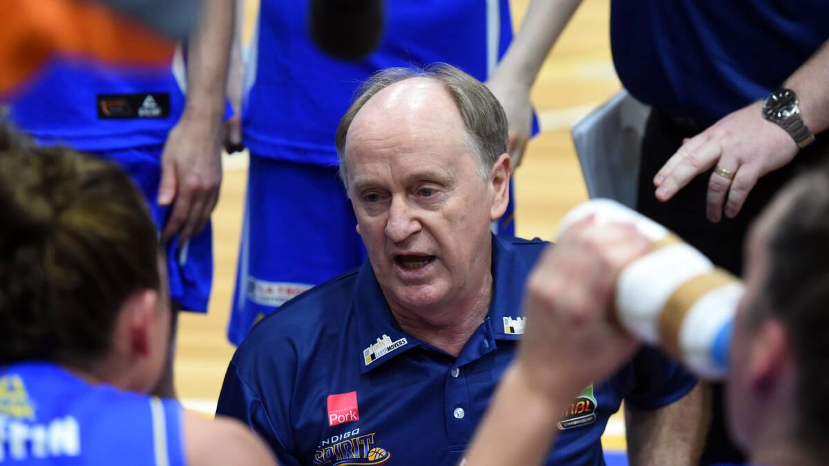 TIME OUT: Bernie Harrower talks tactics during the 2014-15 Women's National Basketball League season. Picture: BILL CONROY