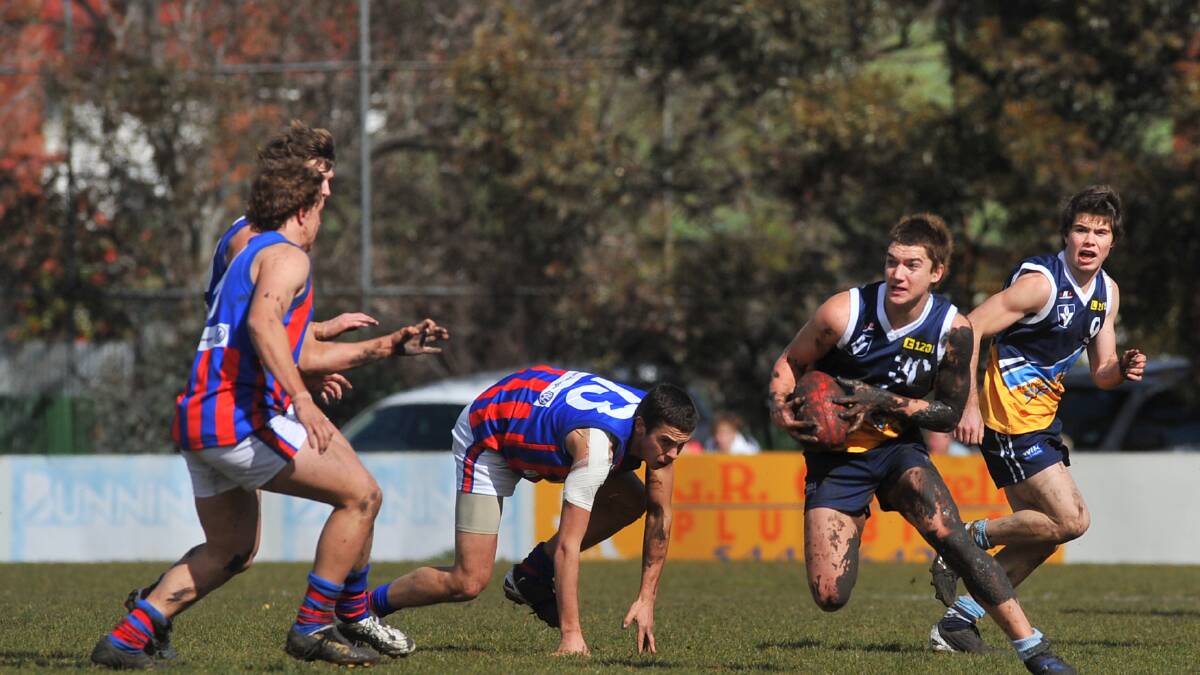 Dustin Martin takes on Oakleigh in 2008 at Golden Square. 