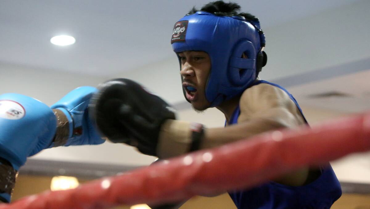 GOING FOR GOLD: Victoria's Henry Stowers boxes in the intermediate 91kg final at the Australian Amateur Boxing League national championships in Bendigo. Picture: LIZ FLEMING
