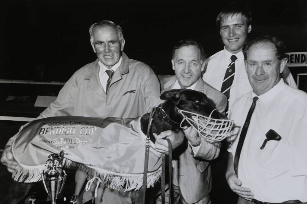 Trainer George Blythe, legendary racecaller Bill Collins, football champion Tony Lockett, and Bendigo Coursing Association president Lex Campbell after He's Jake won the 1991 Bendigo Cup.  