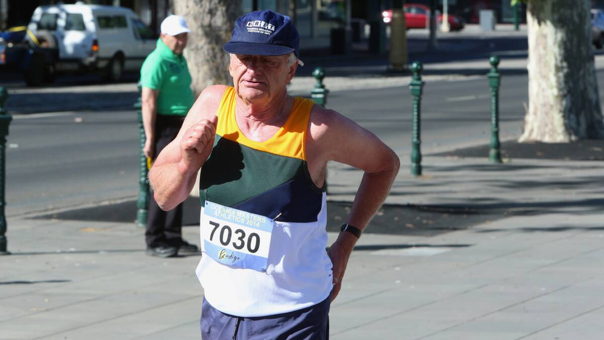 GO WEST: Bendigo's Norm West nears the finish of the 10km walk at the Oceania Masters athletics championships in his home town. Picture: PETER WEAVING 