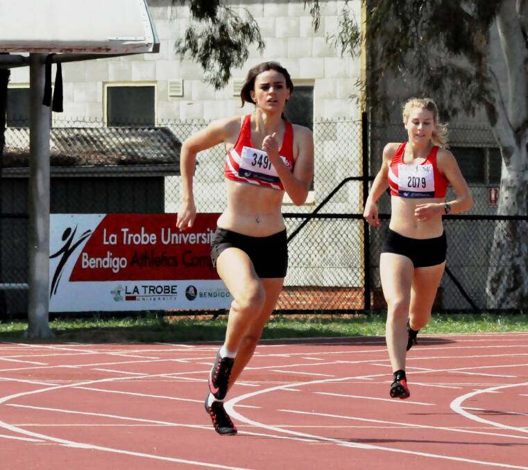 SPRINT: Kaitlyn Bryce and Natasha Fitzpatrick charge onto the home straight during this season's Athletics Bendigo's track and field competition at the Latrobe University Bendigo athletics complex in Flora Hill. Picture: CONTRIBUTED