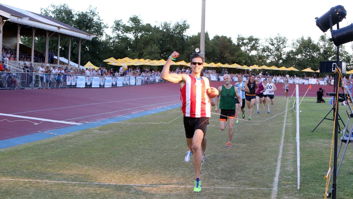 Cameron Clayton wins the WIN Television backmarkers mile. Picture: LIZ FLEMING