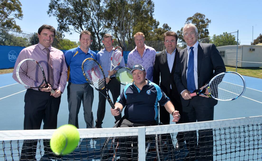 RALLY: Some of the key off-court players in the BTA's festival of tennis with Sports Minister Damian Drum. 