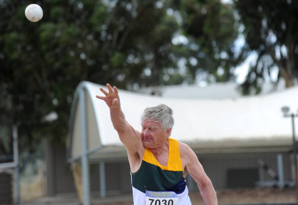 Bendigo's Norm West puts the shot in the 70-74 years final at the Flora Hill complex. 