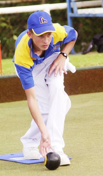 Tim Arnold bowls for Flora Hill Secondary College in the 2005 schools competition. 