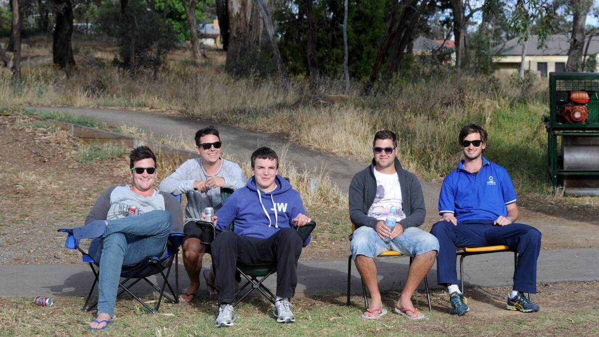 ENJOYING THE ACTION: Sam Baker, Jono Davidson, Daniel Rushworth, Liam Marshall and Jaryd Wishart watch the Twenty20 clash between Strathdale-Maristians and White Hills at Bell Oval. Picture: JODIE DONNELLAN 