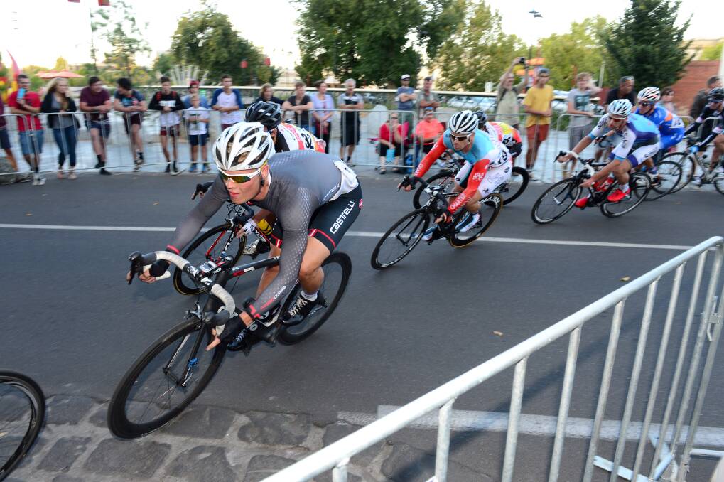 Riders negotiate one of the tricky corners in the Andy's Earthmovers criterium raced in Bendigo's CBD. 