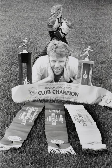 TITLES SPREE: Rick Ermel with the swag of awards won in the 1993 cross-country season.