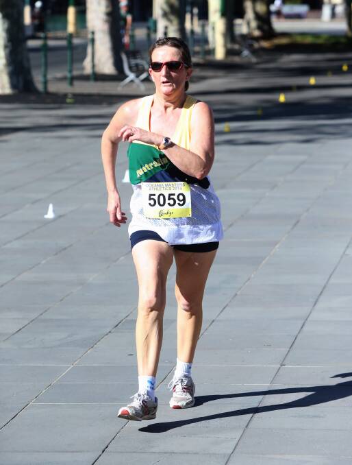 QUICK STEP: Donna-Marie Elms competing in the 50-54 years class of the 10km walk at the Oceania Masters athletics championships in Bendigo. 
