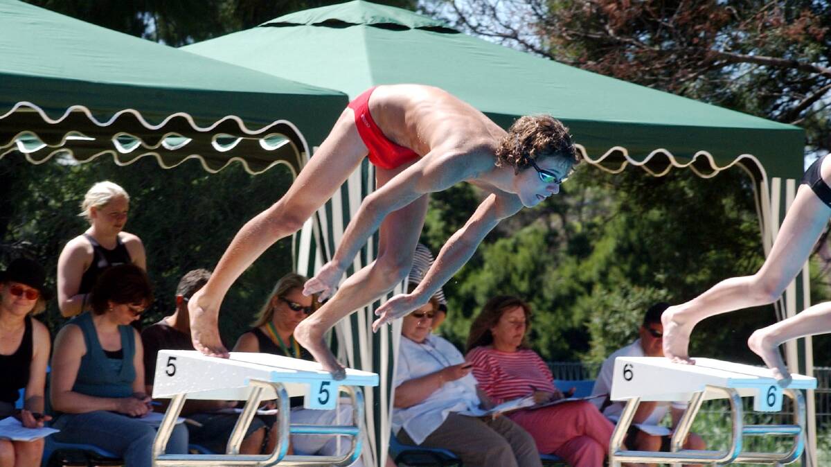 Morgan Coleman dives in for the start of a race. 