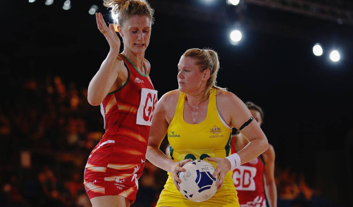 Caitlin Thwaites weighs up options in Australia's victory against Wales at the Glasgow 2014 Commonwealth Games. Picture: GETTY 
