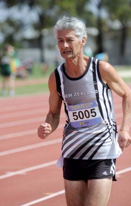 FIGHTING ON: New Zealand's Tim Cross in the 5000m race for the 50-54 years division. 