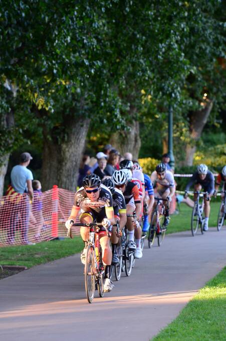 Riders roll through Rosalind Park in the Andy's Earthmovers criterium. 