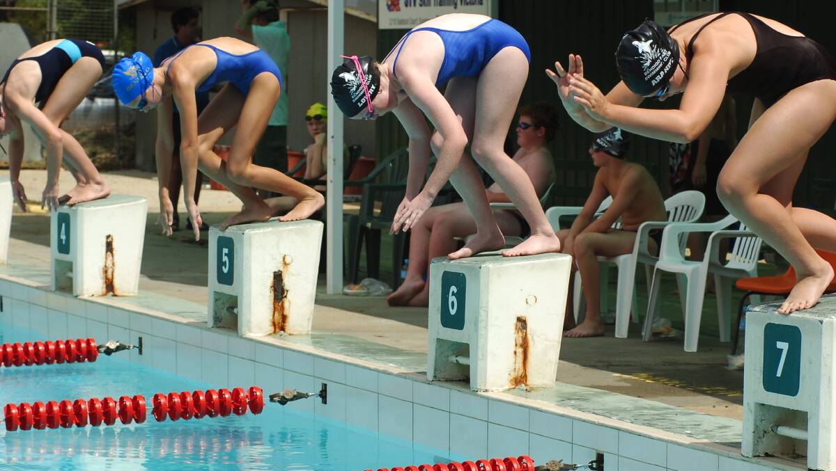 A heat starts at the 2006 district titles at the Bendigo East swimming pool. 