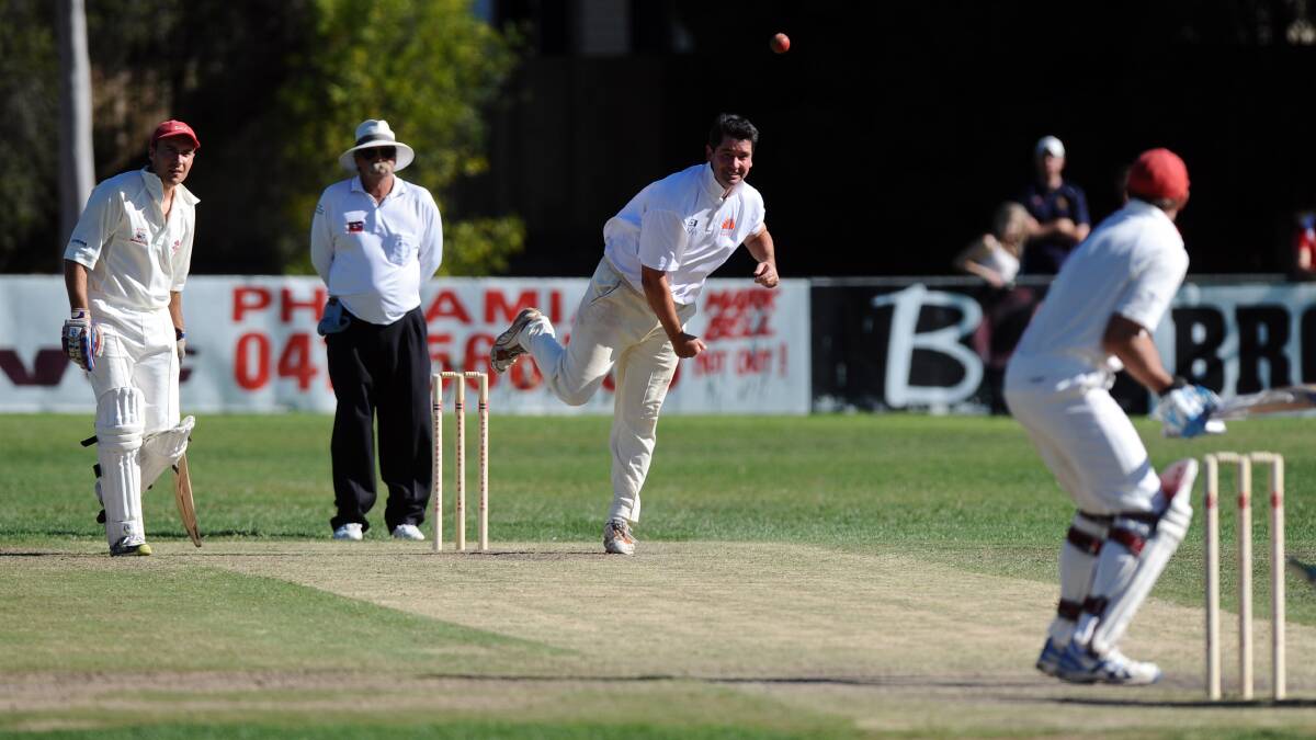 Craig Howard bowls for Strathdale-Maristians in the 2012 grand final win. 