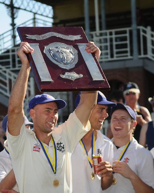 Golden Square captain Brad O'Shea raises the John Lienhop Shield after Golden Square's first XI premiership victory in 2009. 