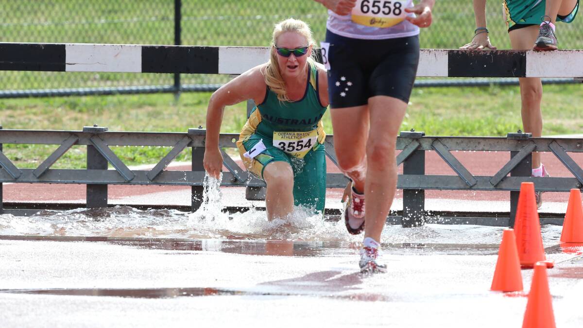 Vicki Charles contests the steeplechase. Picture: LIZ FLEMING 