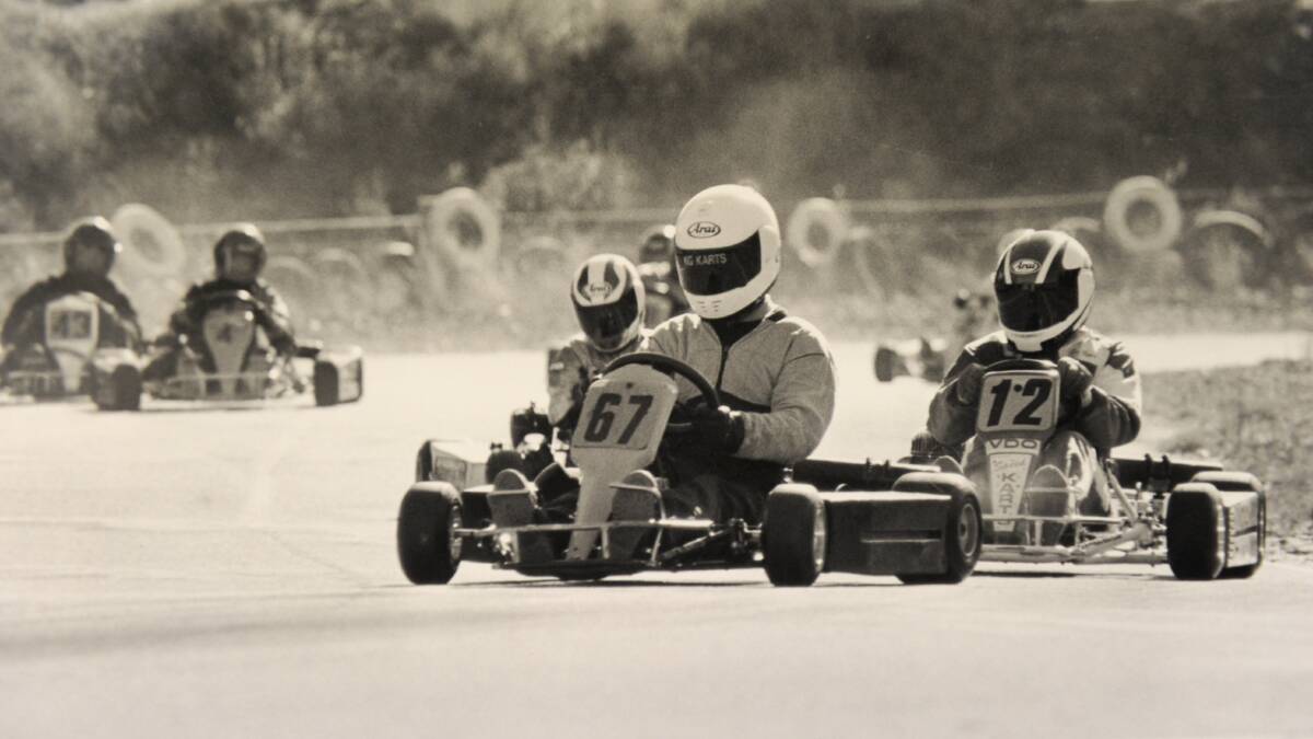 Heath Jelbart, No. 67, and Tom Ceveri, No. 12, do battle in the senior national light class on the Bendigo Go-Kart Club track in 1994. 