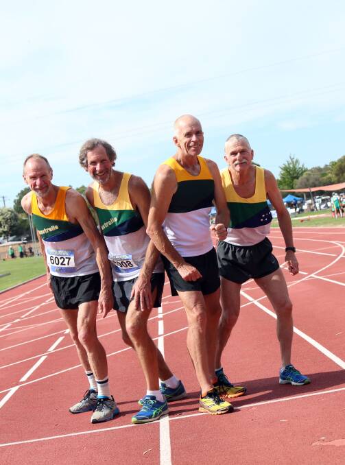 
Australian team-mates Alan Mayfield, Charles Chambers, John Graham and John Herridge broke the national record in the 4 x 1500m relay for the 60-64 years class. Picture: LIZ FLEMING 