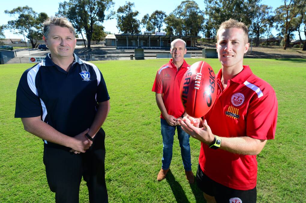 EXCITED:  AFL central Victoria's Justin Abrams, South Bendigo's Rick Townsend and Aaron Connaughton. 