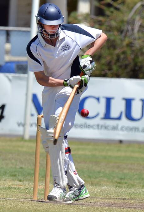 Jackson McEwen plays a leg-glance in his innings for Northern District Colts against Maryborough. 