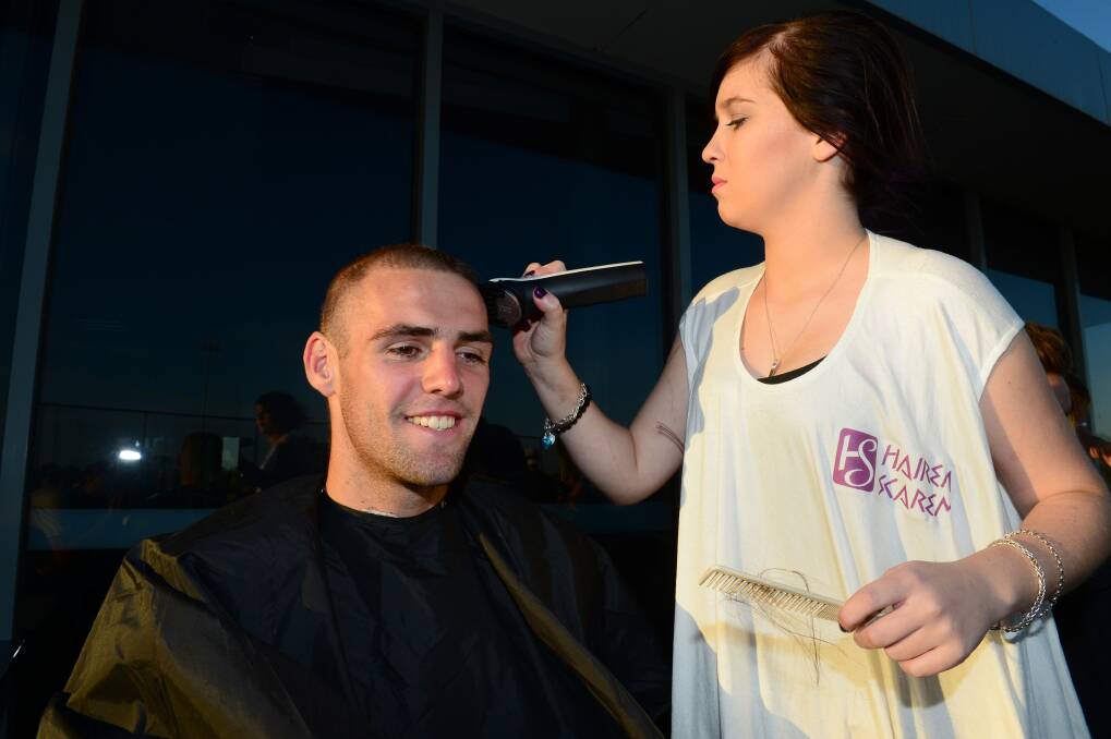 Jordan Mangan has his head shaved by Chloe Ferrari from Hairem Scarem. 