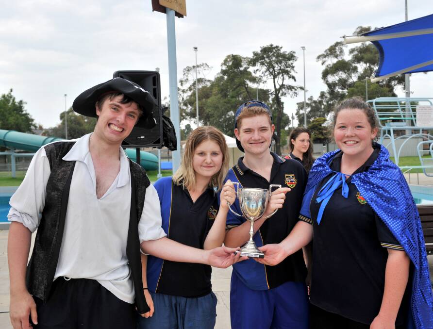 Riley captains Tom Hatcher, Lizzie Wiles, Oscar Black and Isabelle Whiteley with Girton Grammar's Spirit Cup. 