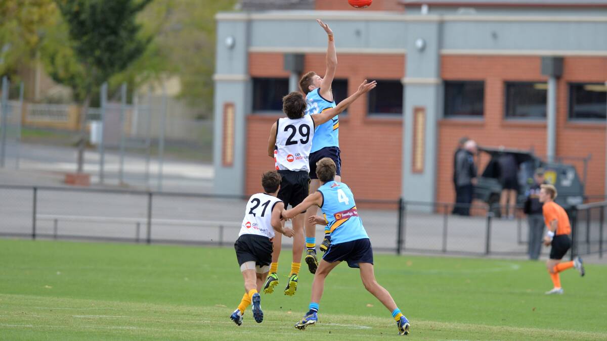 Tyler Phillips from Echuca wins this tap-out in Bendigo's match against Dandenong. 