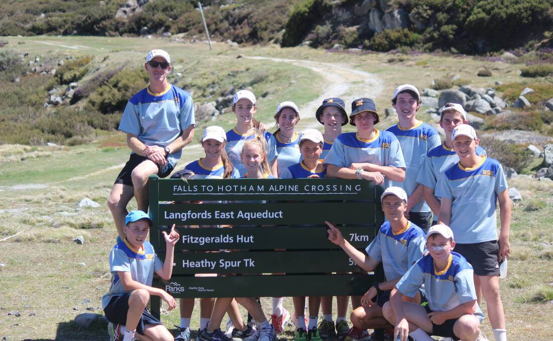 Adam Fleming, top left, with some of the Bendigo South East SC's Athlete Development Program during their training camp at Falls Creek. 