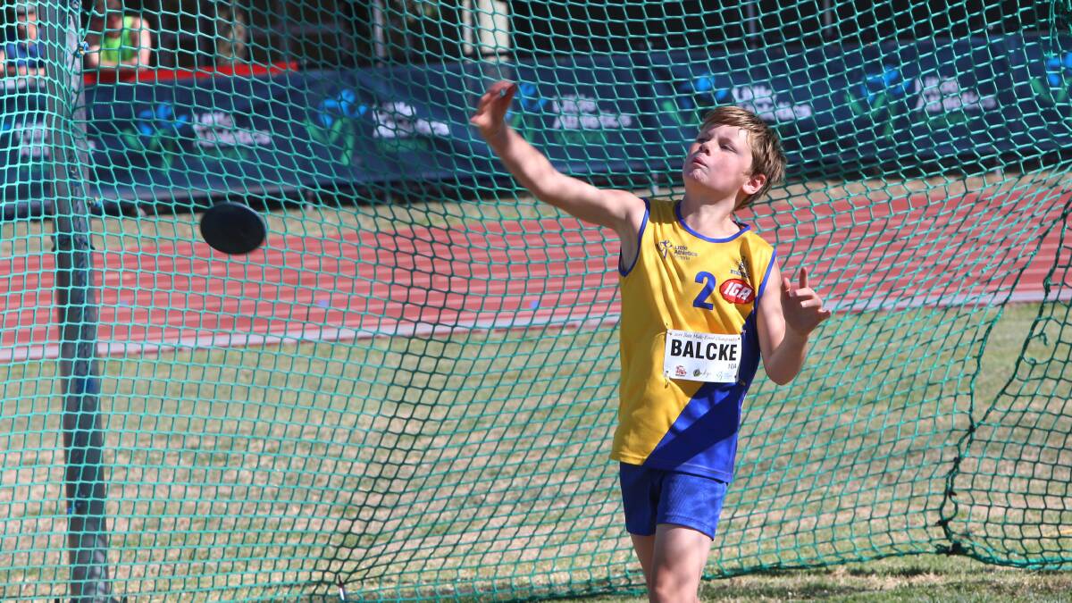 SPIN: Toby Balcke hurls the discus in the under-10 pentathlon. Picture: PETER WEAVING 