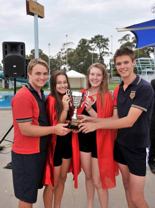 Frew house captains Matthew Keech, Emma Buttolph, Claudia Crawford and Jarrod Tyndall at the finale to Girton's carnival. 