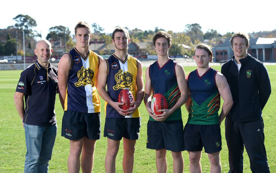 READY FOR BATTLE: Bendigo Senior coach David Newett and key players Daniel Davie and Cameron Barrett with CCB vice-captains Ned Slater and Dylan Morris and coach Lee Coghlan. Picture: JODIE DONNELLAN