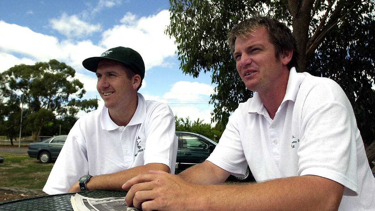 Gisborne's Robbie Fowler and Ant Baker keep an eye on play at North Bendigo in 2005. 