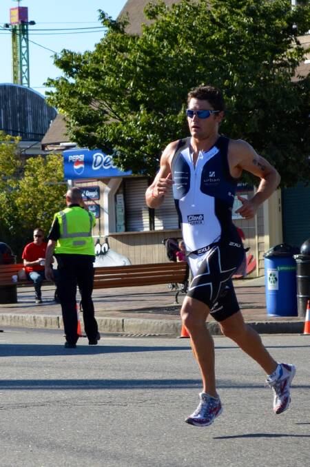 VICTORY: Leon Griffin charges to the finish of the Old Orchard Beach 70.3 classic in Maine. 