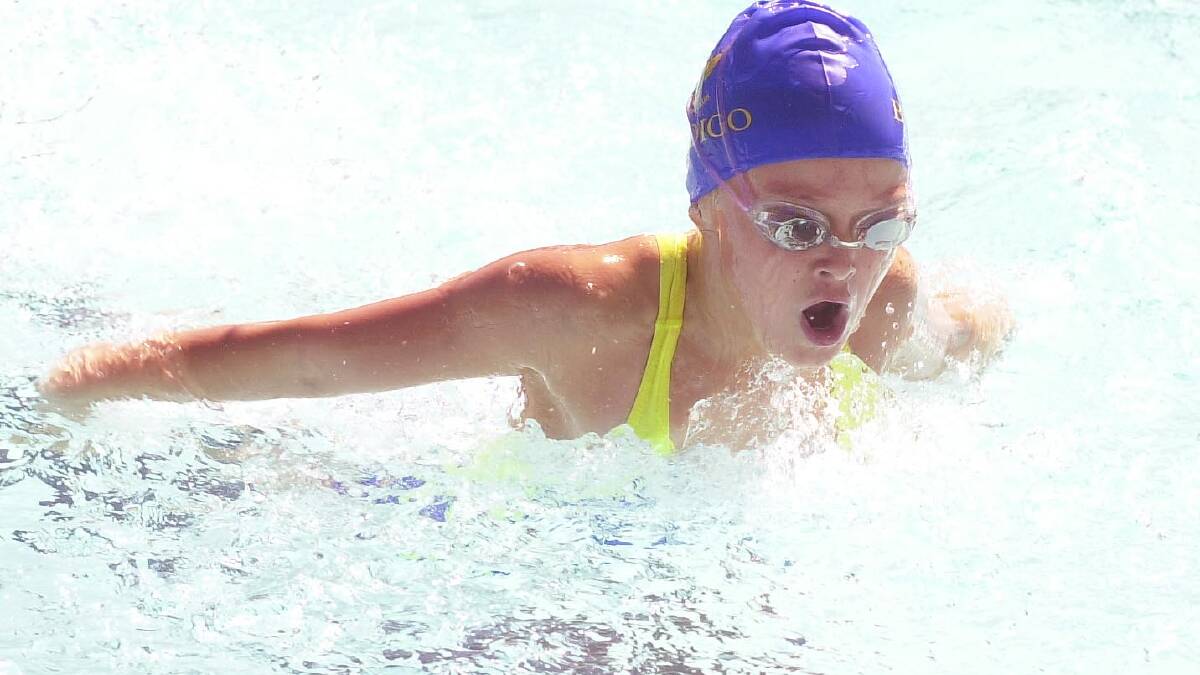 Isabella Johnstone represents St Joseph's Primary School, Quarry Hill in a 50m butterfly final at the 2005 Loddon Campaspe Zone primary school swimming championships at Bendigo East. 