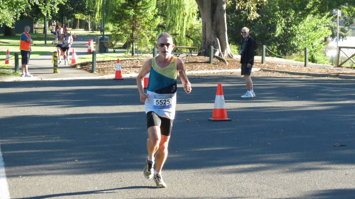 Mark Purvis racing in the Oceania Masters half-marathon in Bendigo. Picture: HUNTER GILL 