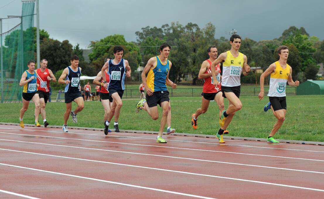 Athletes contest a distance race at an Athletics Bendigo track and field meet at the Latrobe University Bendigo athletics complex in Flora Hill. 
