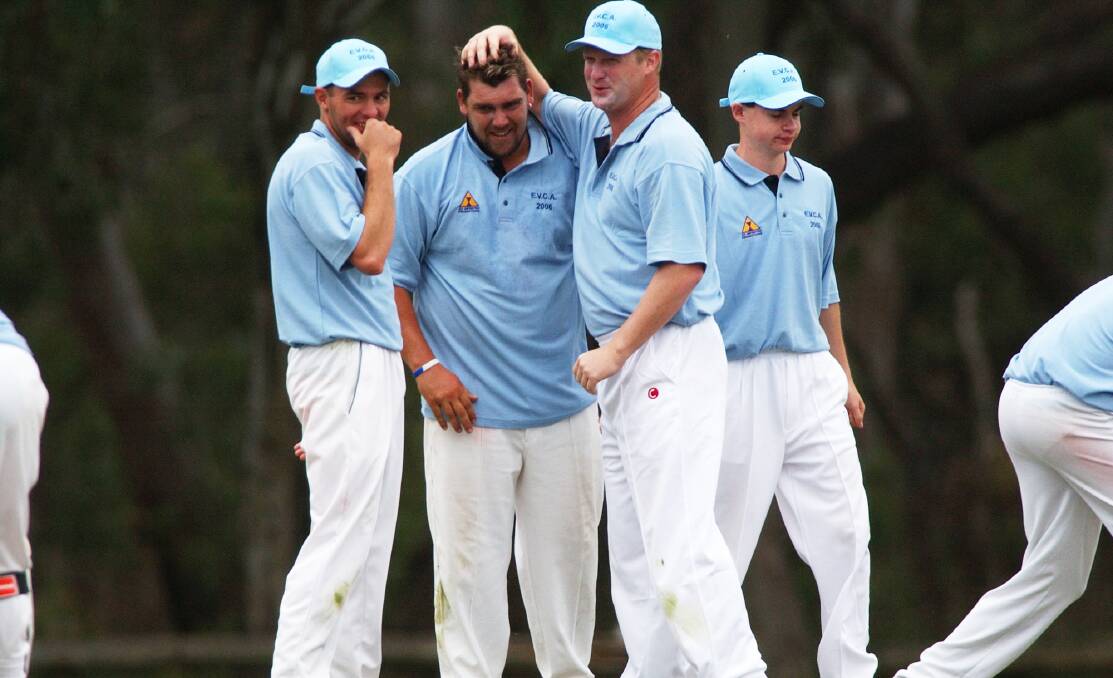 Emu Valley's Nick Manning is congratulated after taking a wicket in the 2006 clash with Campaspe.  