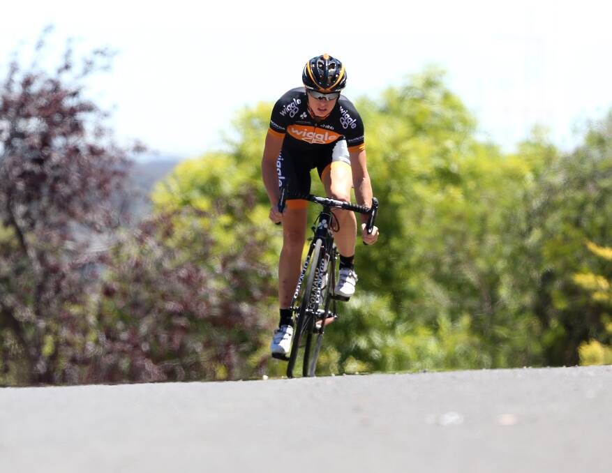 CLIMB: Multi-talented cyclist Peta Mullens rides another crest on the road. Picture: PETER WEAVING