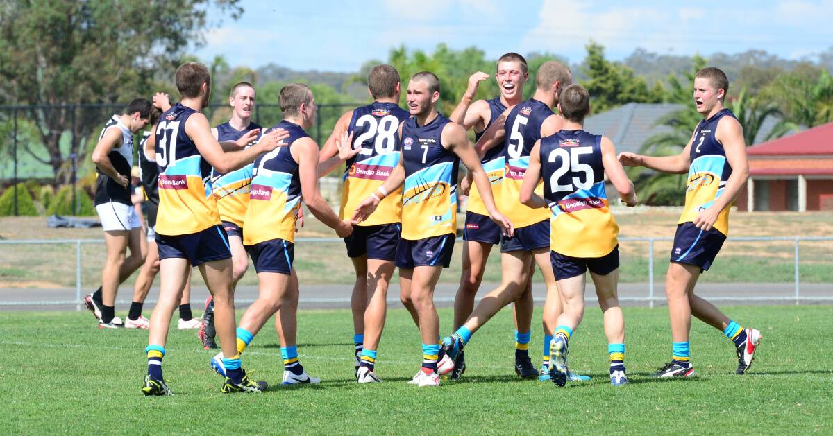 WELL DONE: The Bendigo Pioneers celebrate a goal in their win against North Ballarat. Picture: PETER WEAVING