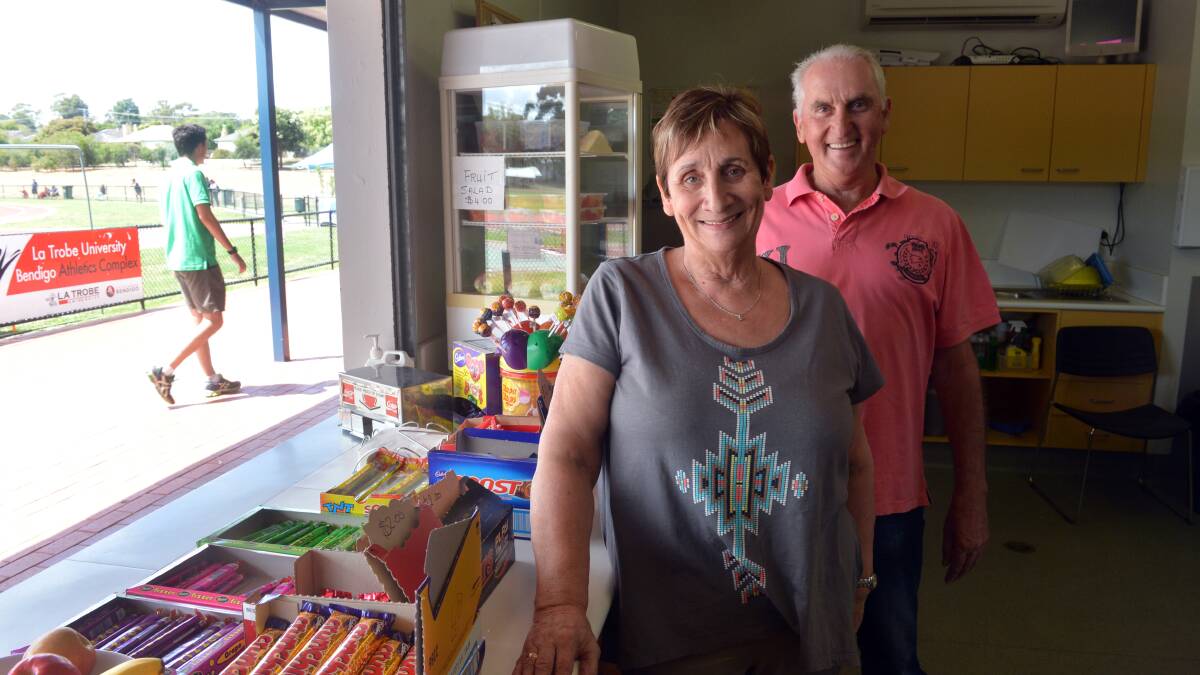 HAPPY TO HELP: Gay and Neil Macdonald working in the kiosk at the La Trobe University Bendigo athletics complex in Flora Hill. Picture: BRENDAN McCARTHY 
