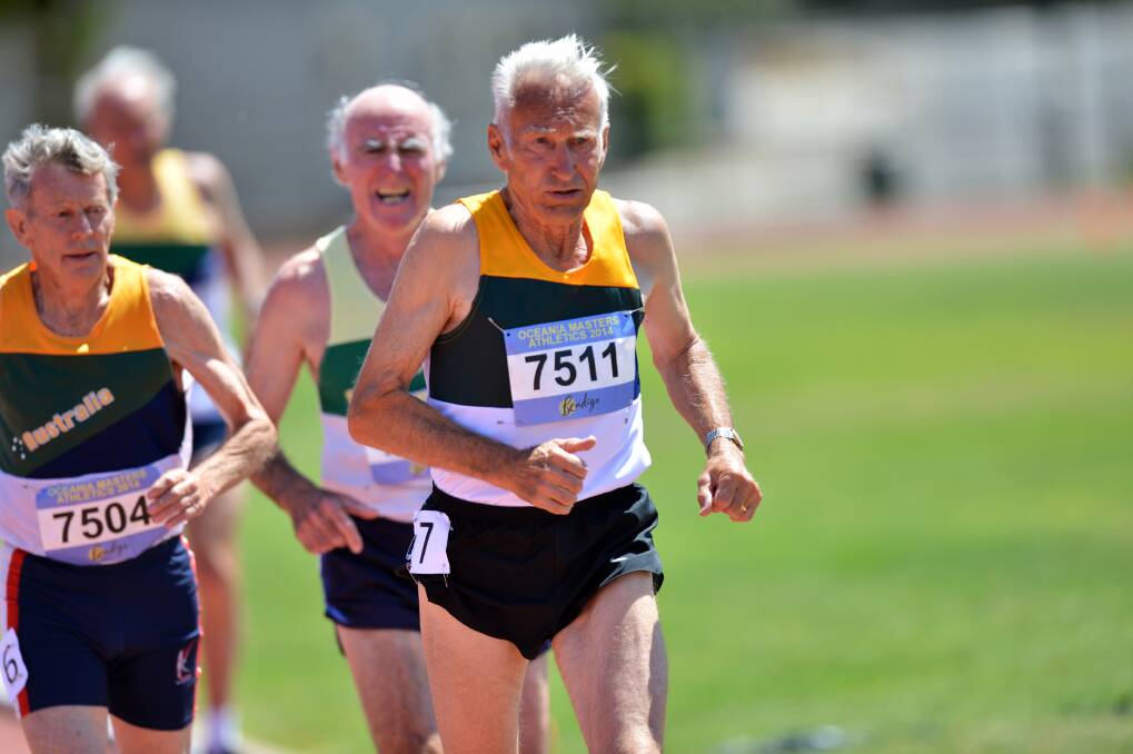 GREAT FORM: Bendigo's John Justice races to victory in the 75-79 years 1500m at the Oceania Masters track and field championships run at the La Trobe University Bendigo athletics complex in Flora Hill. Picture: BRENDAN McCARTHY