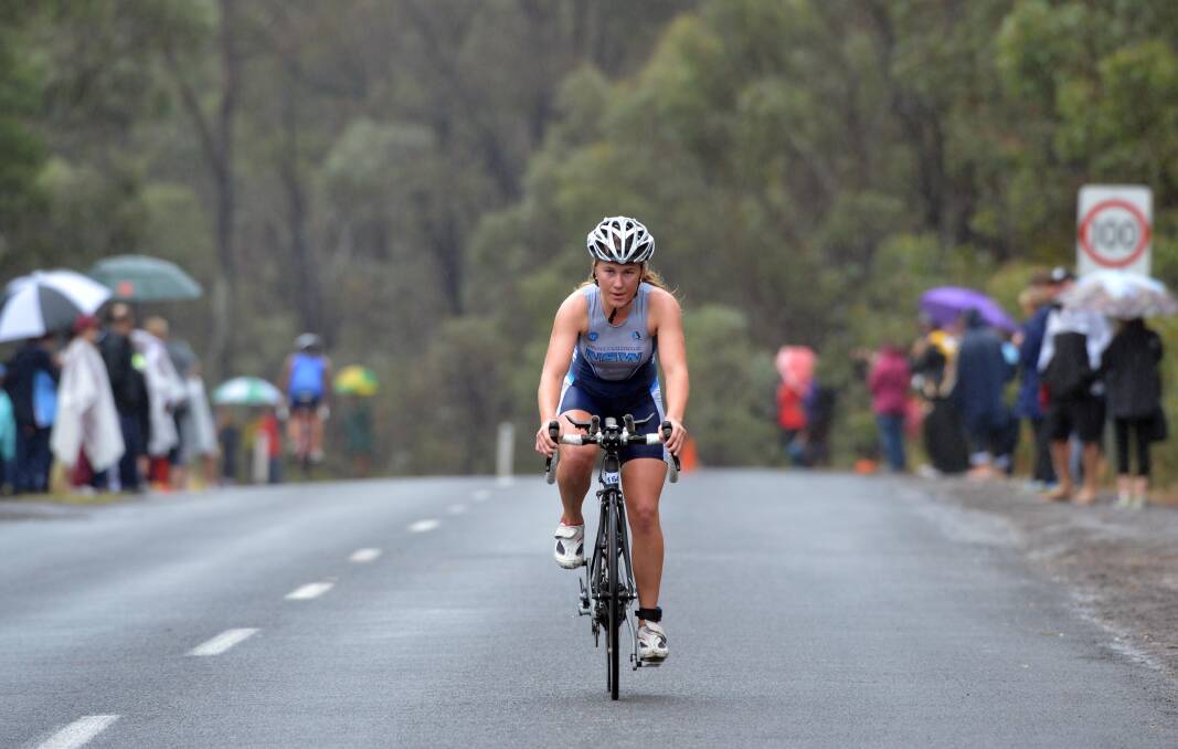 Zoe Radford from New South Wales competes in the 17-19 girls race at the SSA triathlon championships at Crusoe Reservoir in Kangaroo Flat. 
