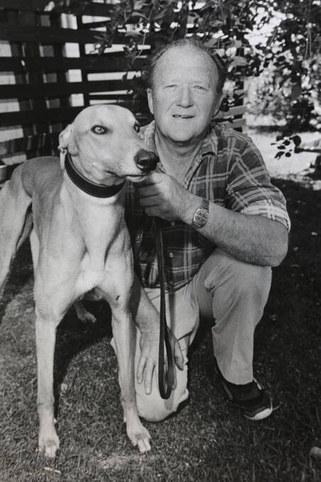 Trainer George Barkmeyer with his dog Henry Murray. 