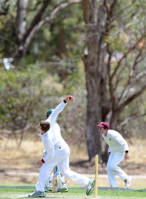 ATTACK: Max Clayton bowls for Queensland against ACT at Strathdale's Bell Oval. Picture: LIZ FLEMING 