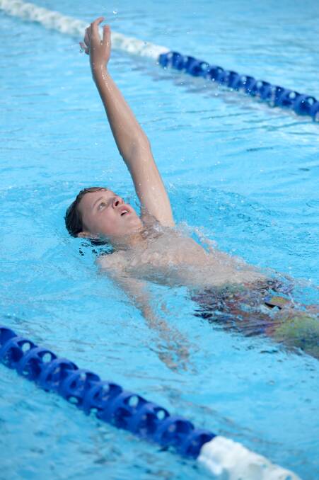 BACKSTROKE: Thomas Wigney in the 14-years race at Crusoe College's carnival.  